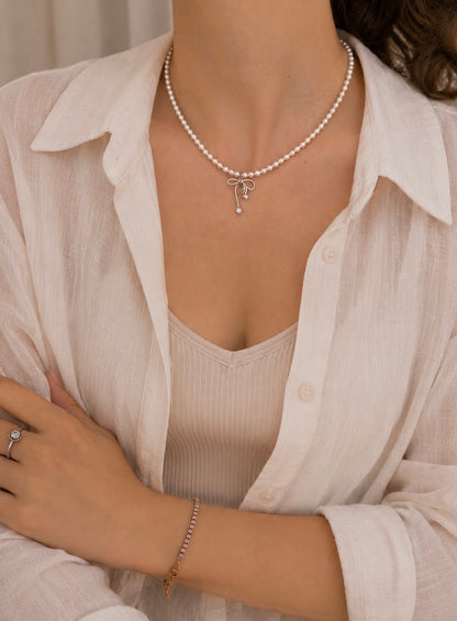 Colier cu perle și pandantiv fundiță  Ribbon Pearl